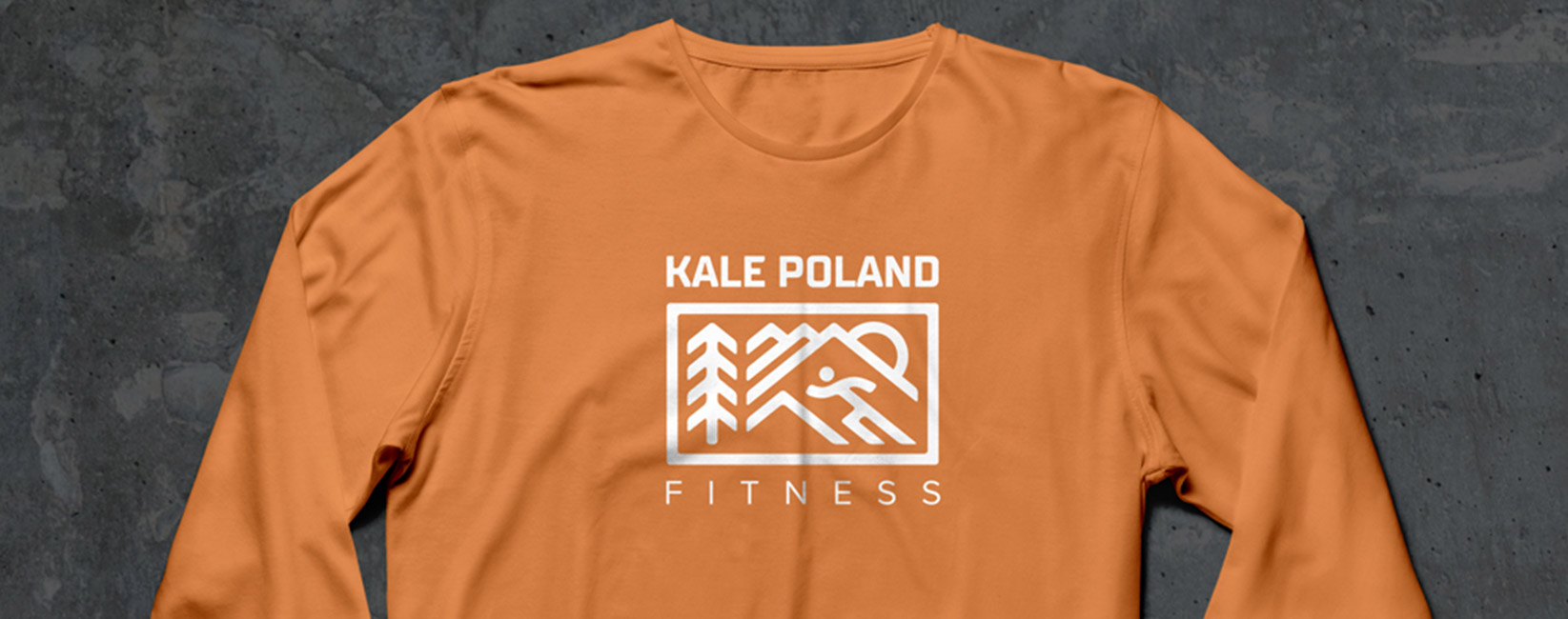 Orange Kale Poland Fitness long-sleeve shirt with the white outdoor lockup printed on the chest